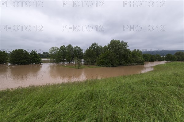 Symbolic image extreme weather, global warming, climate change, flood retention basin, flood