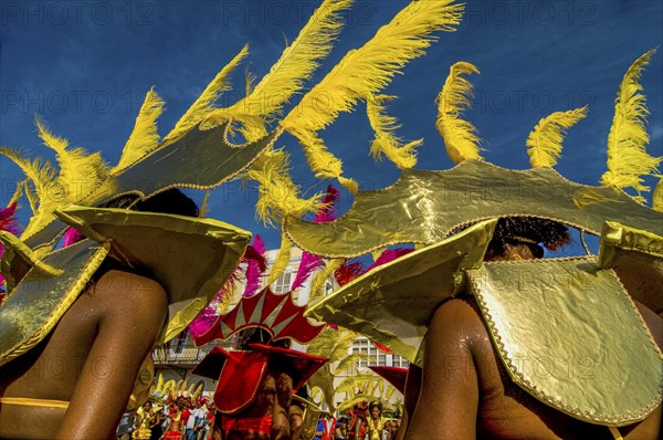 Colourful costumed, pretty women are dancing. Carnival. Mindelo. Cabo Verde. Africa