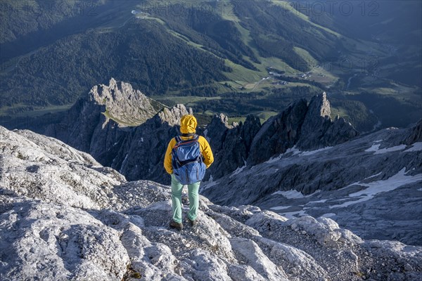 Hiker Looking down into the valley from the Hochkönig, Salzburger Land, Austria, Europe