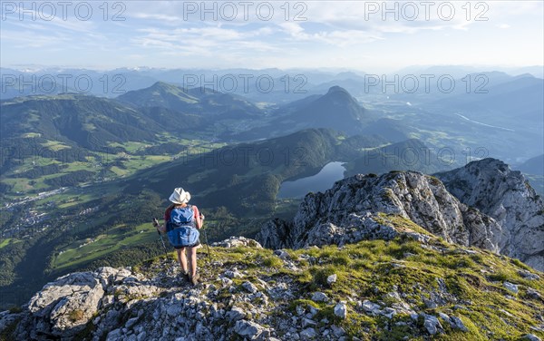 Hintersteiner Lake in the mountains, view from Schaffauer, hiker on a ridge in the mountains,
