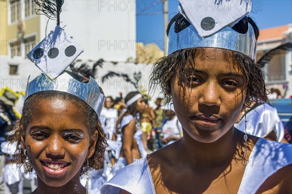 Costumed people celebrating Carnival. Mindelo. Cabo Verde. Africa