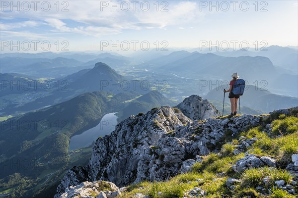 Hintersteiner Lake in the mountains, view from Schaffauer, hiker on a ridge in the mountains,