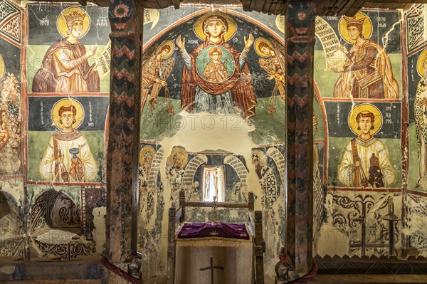 The painted interior of the barn-roofed Church of Archangelos Michail or Church of St. Michael the