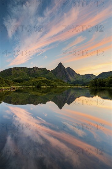 Mountains and clouds reflected in the sea, evening mood, near Sto, Langoya Island, Vesteralen,