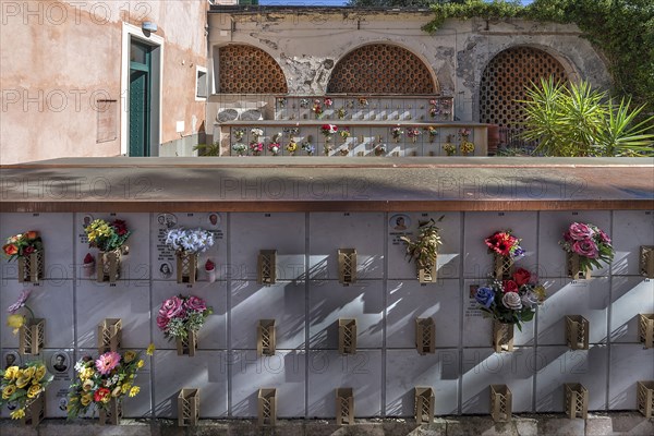 Flower-decorated urn graves in an inner courtyard, Monumental Cemetery, Cimitero monumentale di