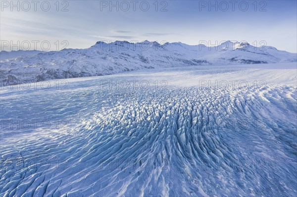 Aerial view over ice tongue Falljökull in winter, one of many outlet glaciers of Vatnajökull, Vatna