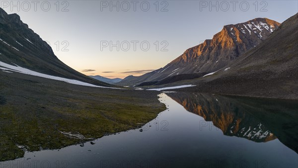 Kaskasavagge valley, mountain reflected in lake, Gaskkasjohka river, Kebnekaise massif, Lapland,