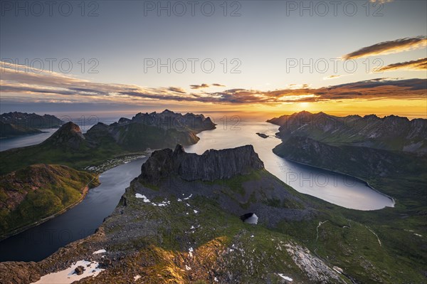 View over Senja's fjords and mountain peaks under the midnight sun, Mount Grytetippen, Senja,