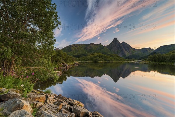 Mountains and clouds reflected in the sea, evening mood, near Sto, Langoya Island, Vesteralen,