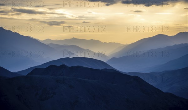 Mountain silhouettes at sunset, Konorchek Canyon, Chuy, Kyrgyzstan, Asia