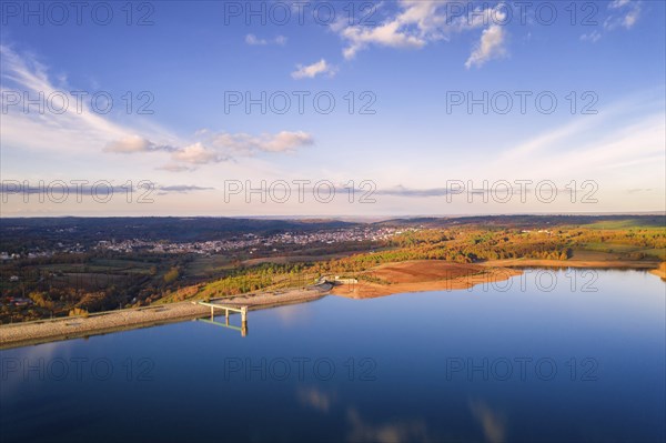 Drone aerial panoramic view of Sabugal Dam lake reservoir with perfect reflection, in Portugal