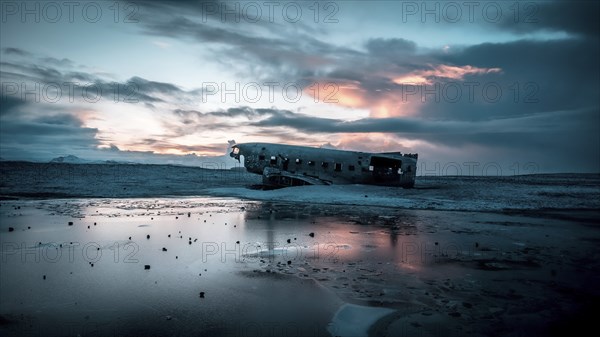 Aerial drone view of crashed plane on frozen Solheimasandur beach in winter, Iceland, Europe