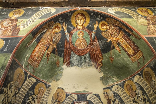 The painted interior of the barn-roofed Church of Archangelos Michail or Church of St. Michael the