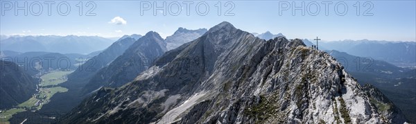 Aerial view, Alpine panorama, hikers at the summit cross, Westliche Wettersteinspitze, Wetterstein