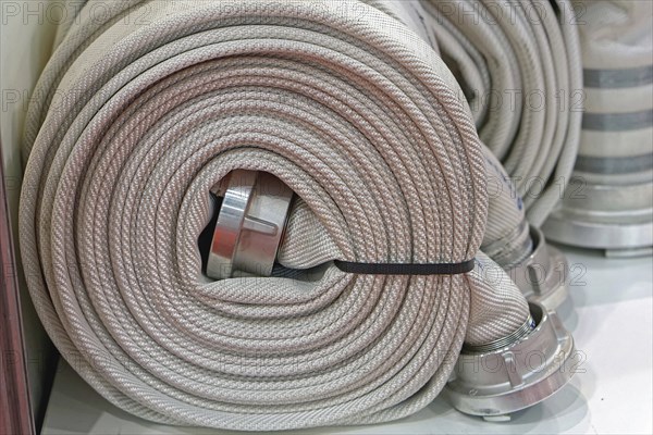 High pressure fire hose in coil