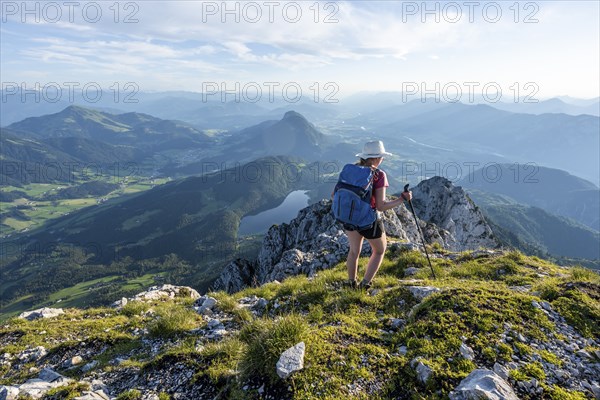 Hintersteiner Lake in the mountains, view from Schaffauer, hiker on a ridge in the mountains,