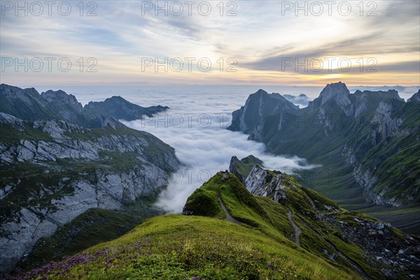 Alpstein, valley of Meglisalp at sunrise, high fog in the valley, Säntis, Appenzell Ausserrhoden,