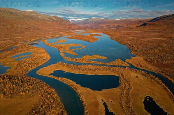Drone shot, view of the valley Vistasvagge with the meandering river Vistasjakka and countless