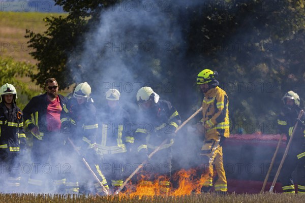 During controlled field fires, the firefighters were able to test various extinguishing methods,