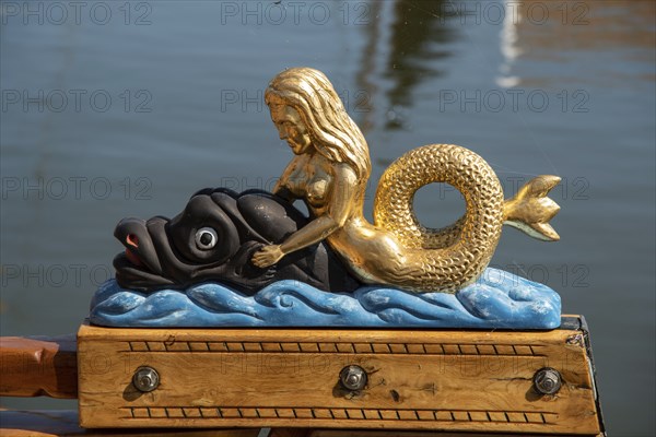 Enkhuizen, Netherlands, June 2022. The decorated helm stol of a barge at the Zuiderzee Museum in