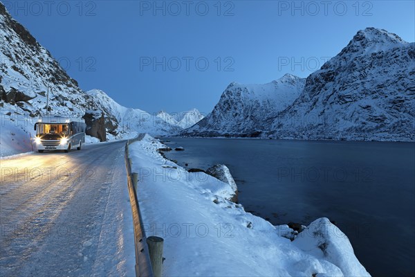 With motorhome on the E10 at Flakstadpollen in winter, Lofoten, Norway, Europe
