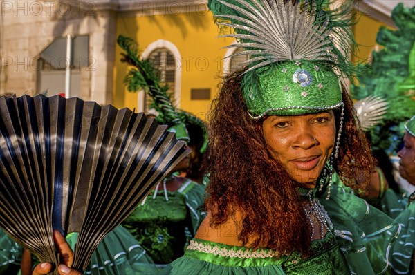 Happy, colourful costumed people. Carnival. Mindelo. Cabo Verde. Africa