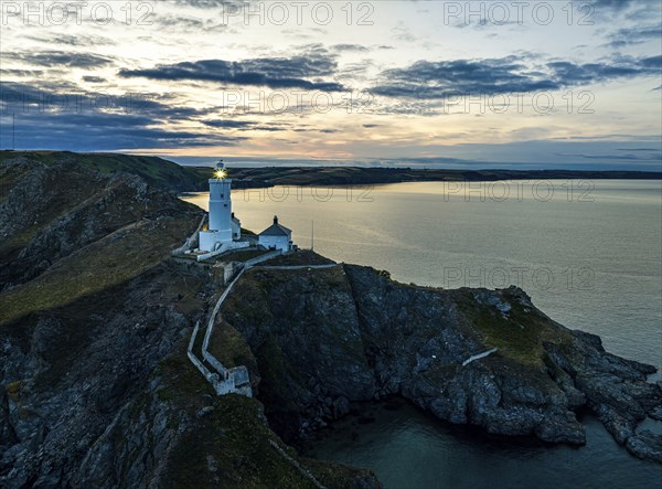 Sunset over Start Point Lighthouse from a drone, Trinity House and South West Coast Path, Devon,