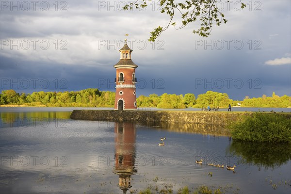 Lighthouse at the Fasanenschlösschen in Moritzburg with thunderstorm sky