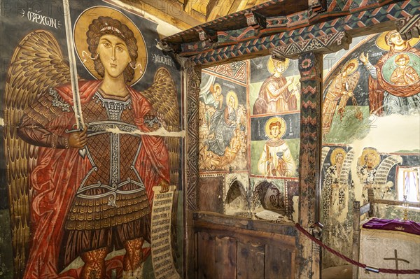 The painted interior of the barn-roofed Church of Archangelos Michail or Church of St. Michael the