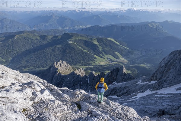 Hiker Looking down into the valley from the Hochkönig, Salzburger Land, Austria, Europe