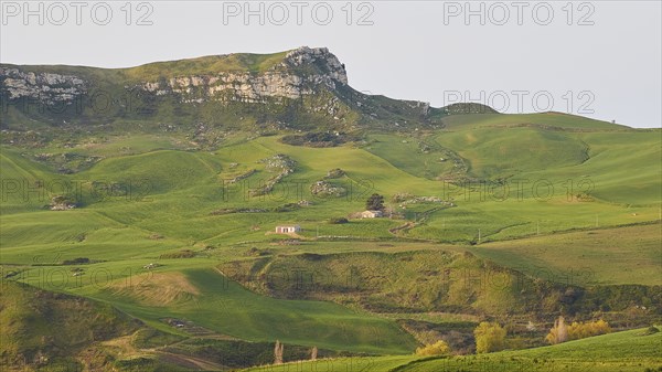 Mountain, green hillsides, fields, houses, Madonie National Park, spring, Sicily, Italy, Europe