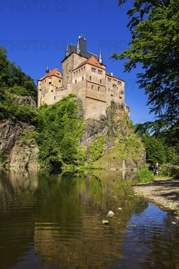 DEU Saxony Kriebstein Kriebstein Castle rises on a steep rock above the Zschopau. Within the large