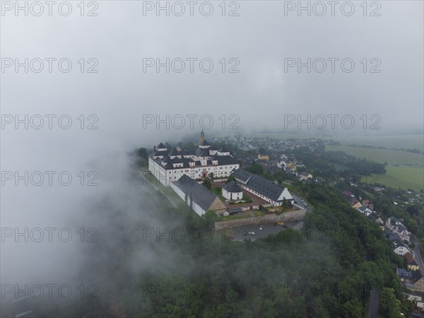 Augustusburg in fog and rain