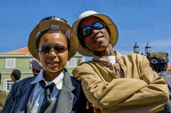 Young men, dressed as businesspeople. Carnival. Mindelo. Cabo Verde. Africa