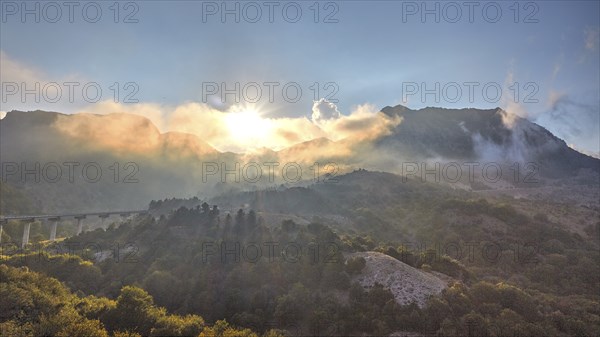 HDR shot, fog, clouds, backlight, bridge, mountains, Madonie National Park, spring, Sicily, Italy,