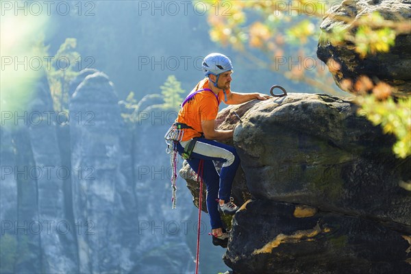 Climbers in Rathen in Saxon Switzerland