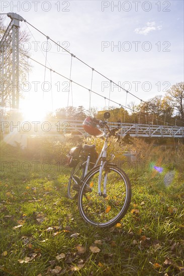 Symbolic image Resting on an e-bike tour in the Leipzig region in Grimma at the Mulde bridge