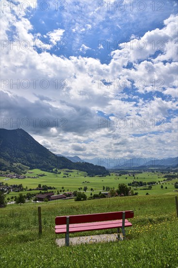 Resting bench on the Gebhardshöhe above the municipality of Rettenberg in Allgäu, Bavaria, Germany,