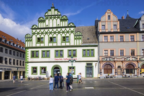 The square was given its distinctive shape in the 16th century by the town house and the