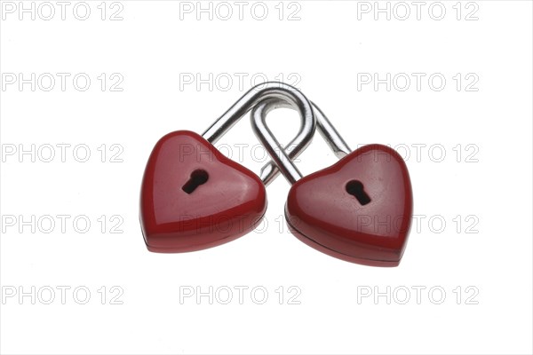 Two small red padlocks are linked together