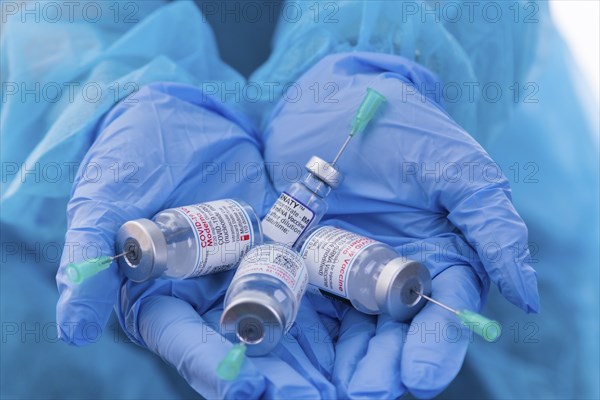 Medical professionals hold corona vaccine