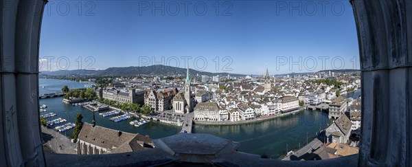 Panorama, view over the old town of Zurich with river Limmat, church Fraumünster and Münsterbrücke,