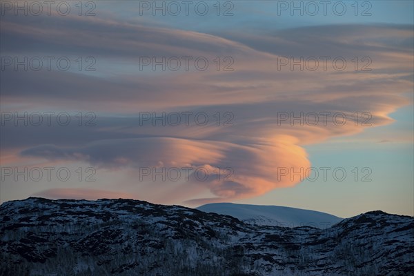 Lenticular clouds, Altocumulus lenticularis in winter in Norway