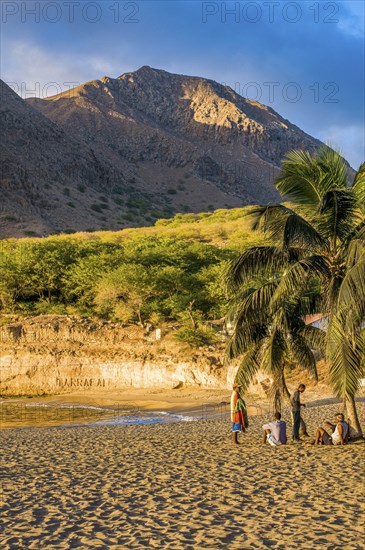 Young men, staying afternoon at sandbeach. Tarrafal. Santiago. Cabo Verde. Africa