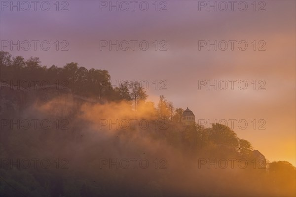 Sunset over the Königstein. Königstein Fortress is one of the largest mountain fortresses in Europe