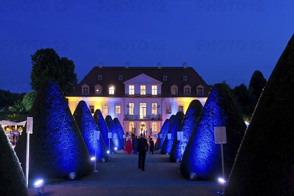Summer night ball at Wackerbarth Castle. Schloss Wackerbarth or Wackerbarths Ruh' is a baroque