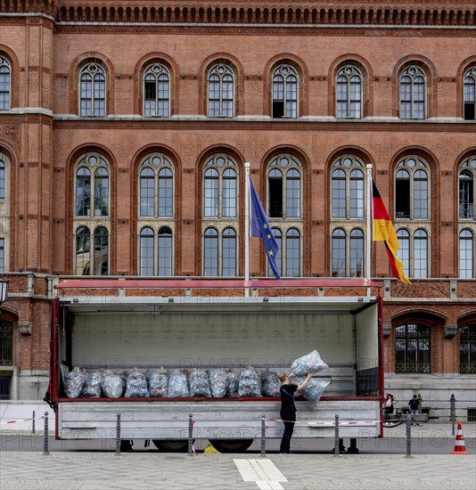 Young people collecting and loading plastic empties, Special Olympics, Berlin, Germany, Europe