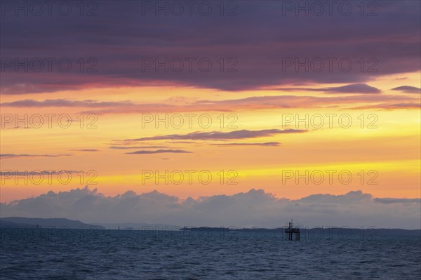 Sunset with thunderstorm atmosphere, clouds, water, summer, Langenargen, Baden-Württemberg,