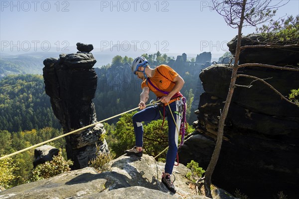 Climbers in Rathen in Saxon Switzerland