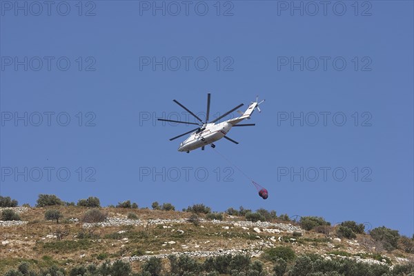 Helicopter, helicopter, fire-fighting helicopter, fire, helicopter flies over mountainside,